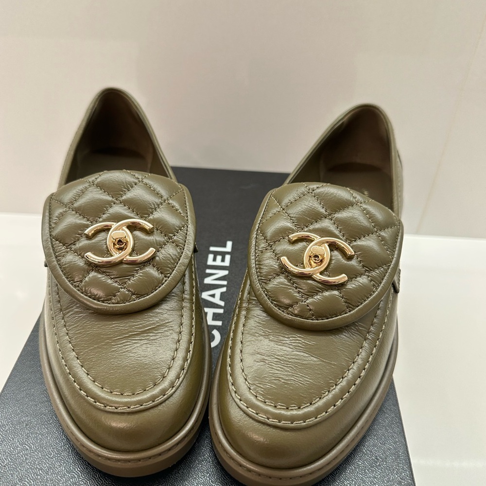 CHANEL Quilted Olive Loafers with Gold Accent